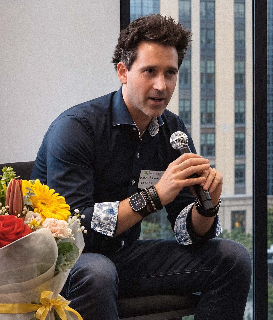 Mark Lazarus speaking at an event in Sydney